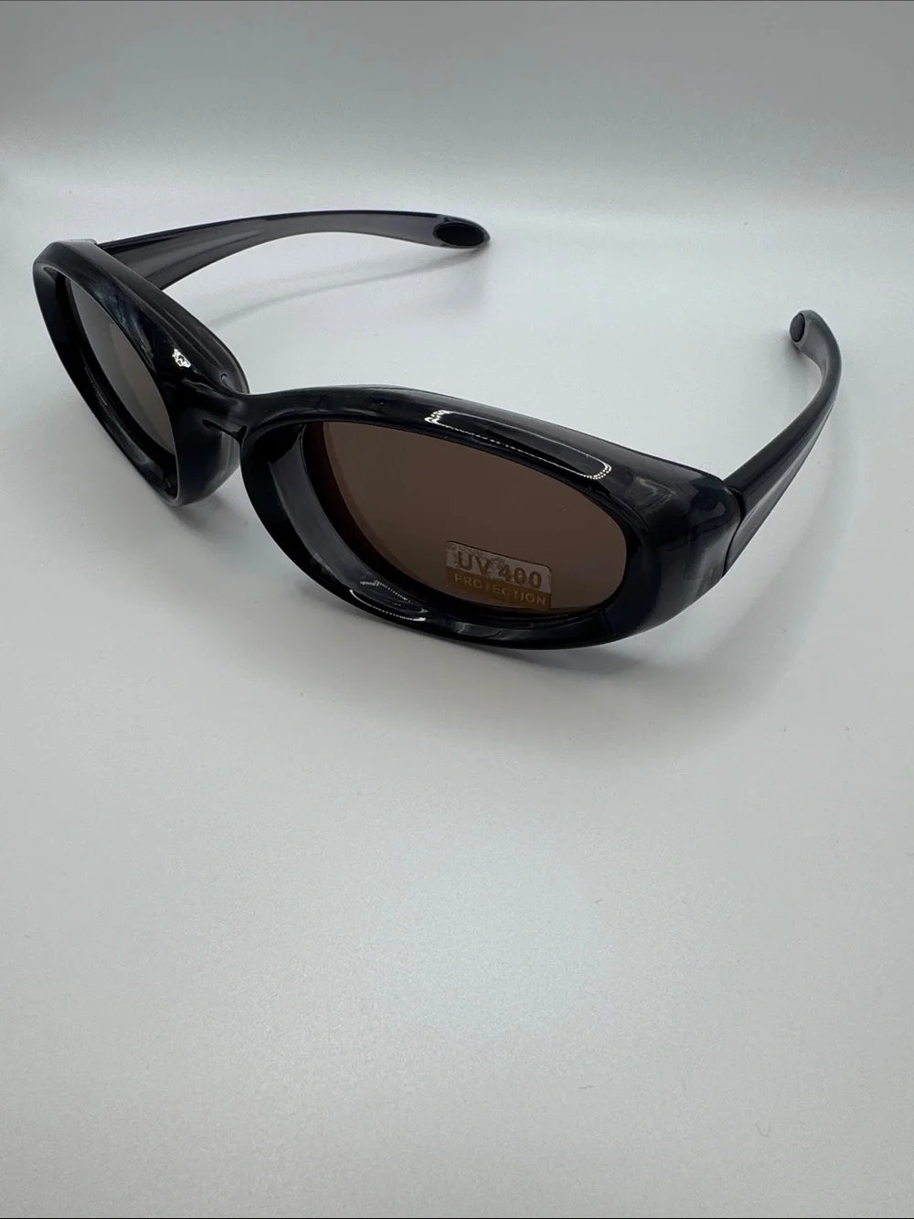 Women's Black Oval Sunglasses with Brown Lenses - UV400 Protection